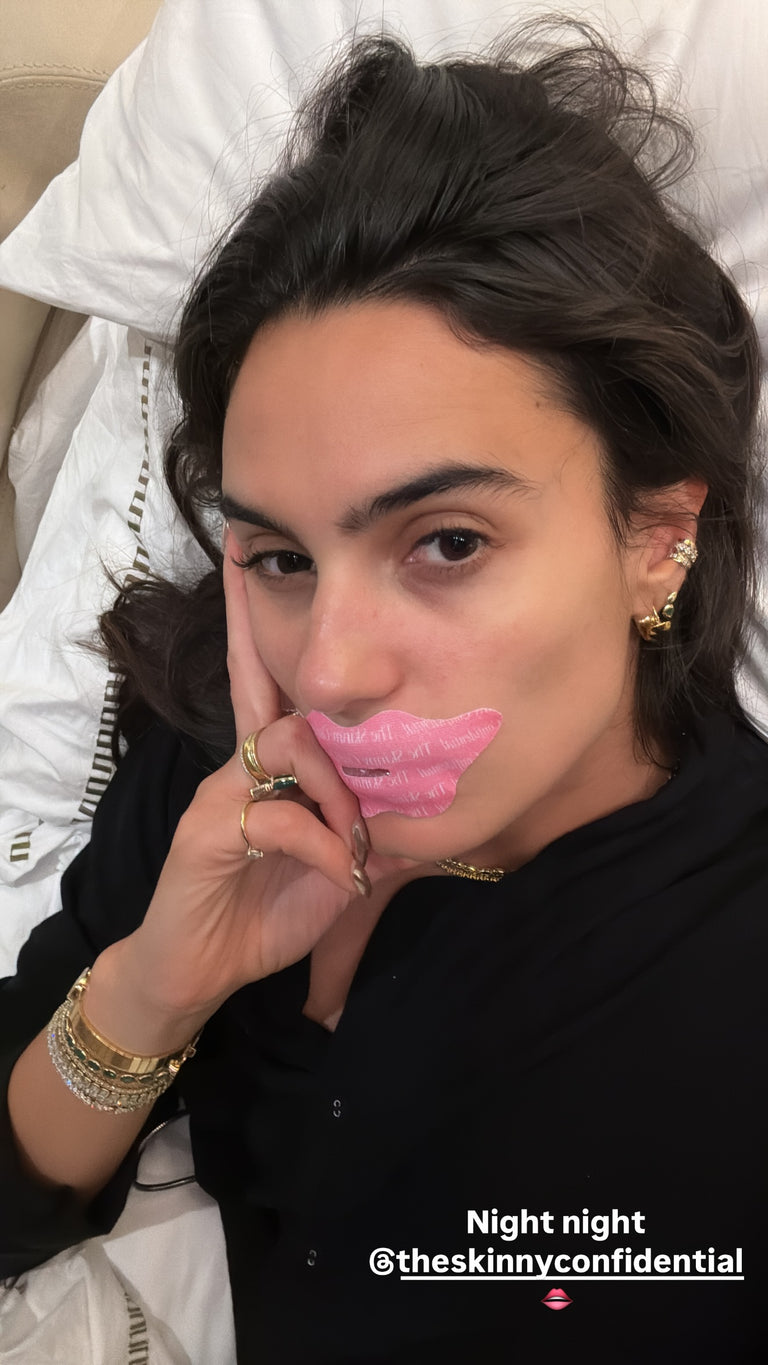 woman with lip mask lying on bed woman with lip mask lying on bed